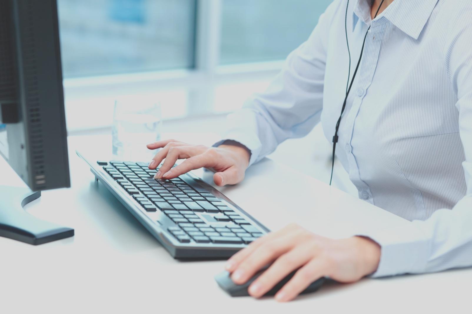 Business professionals reviewing financial planning materials during a collaborative workshop session